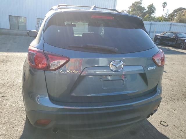 Photo 6 from auction – 2015 MAZDA CX-5 TOURI with VIN JM3KE2CY3F0489162