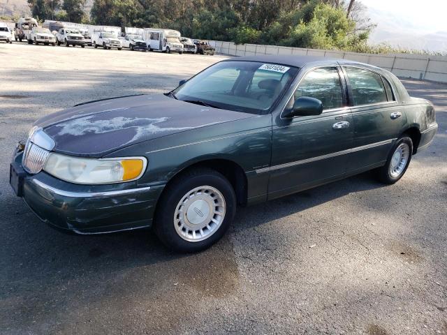 LINCOLN TOWN CAR E 2000 with VIN 1LNHM81W9YY938225 - Photo from auction