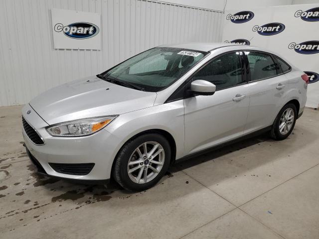 FORD FOCUS SE 2018 with VIN 1FADP3F26JL297501 - Photo from auction