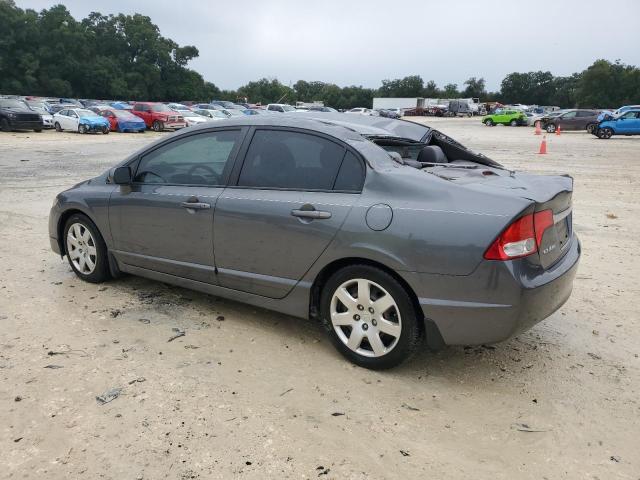 Photo 2 from auction – 2011 HONDA CIVIC LX with VIN 19XFA1F52BE012791