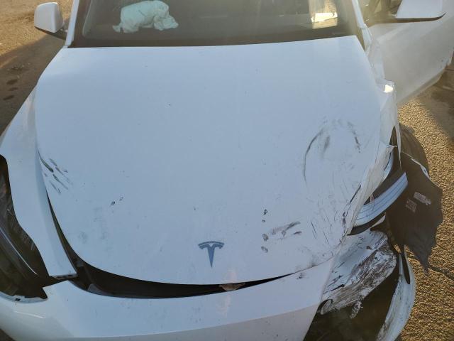 Photo 12 from auction – 2021 TESLA MODEL Y with VIN 5YJYGAEE0MF196814