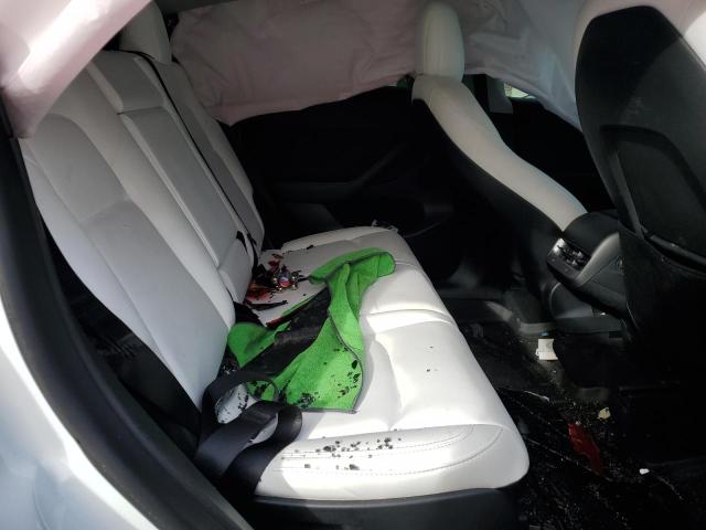 Photo 11 from auction – 2022 TESLA MODEL Y with VIN 7SAYGAEE0NF551470