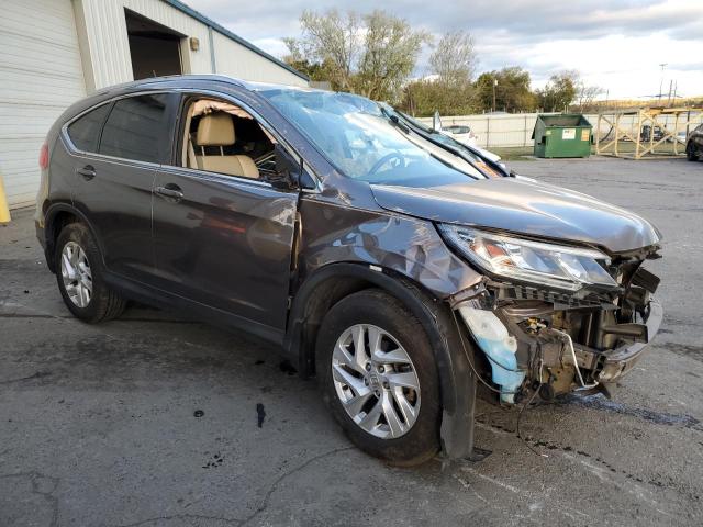 Photo 4 from auction – 2015 HONDA CR-V EXL with VIN 2HKRM4H72FH670472