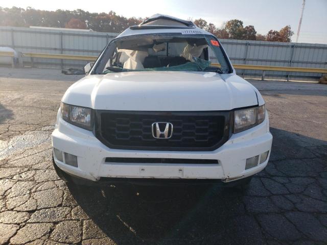 Photo 5 from auction – 2014 HONDA RIDGELINE with VIN 5FPYK1F68EB010404