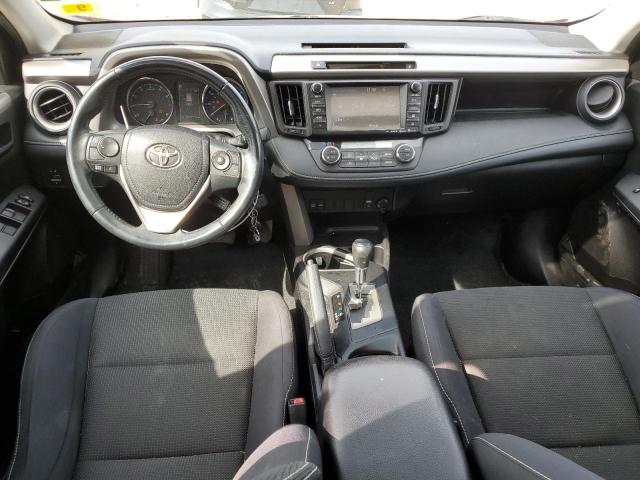 Photo 8 from auction – 2016 TOYOTA RAV4 XLE with VIN 2T3RFREV7GW464035