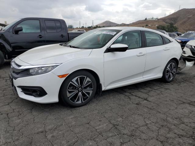 Photo 1 from auction – 2016 HONDA CIVIC EX with VIN 2HGFC1F38GH637685