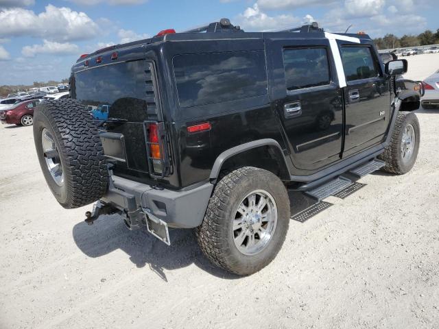 Photo 3 from auction – 2003 HUMMER H2 with VIN 5GRGN23U33H102570