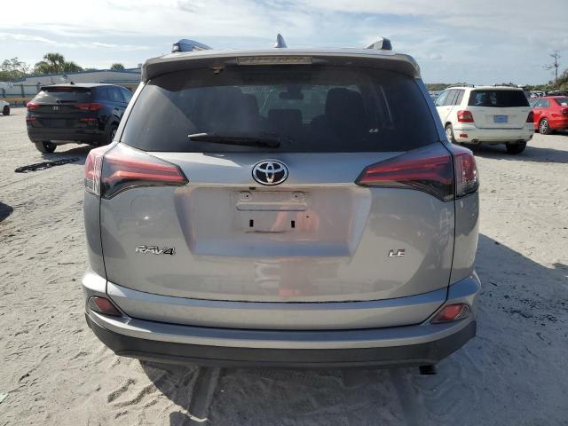 Photo 6 from auction – 2018 TOYOTA RAV4 LE with VIN 2T3ZFREV9JW520063