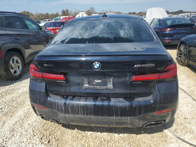 Photo 6 from auction – 2023 BMW M550XI with VIN WBA13BK07PCL43527