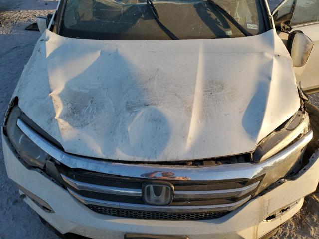 Photo 12 from auction – 2018 HONDA PILOT ELIT with VIN 5FNYF6H04JB049519