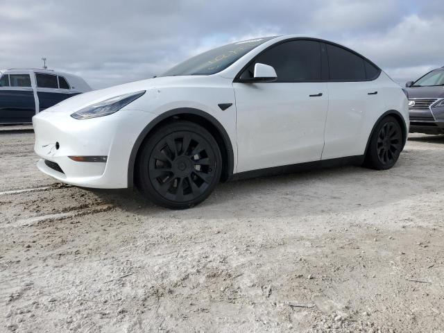 TESLA MODEL Y 2022 with VIN 7SAYGAEE1NF420838 - Photo from auction