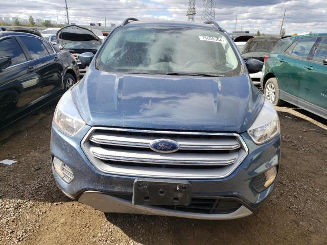 Photo 5 from auction – 2018 FORD ESCAPE SE with VIN 1FMCU0GD2JUC32356