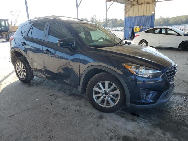 Photo 4 from auction – 2016 MAZDA CX-5 TOURI with VIN JM3KE2CY4G0870794