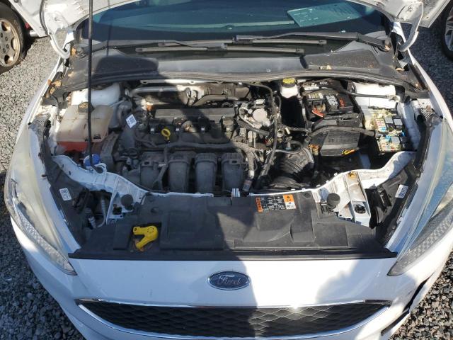 Photo 11 from auction – 2018 FORD FOCUS S with VIN 1FADP3E22JL209402