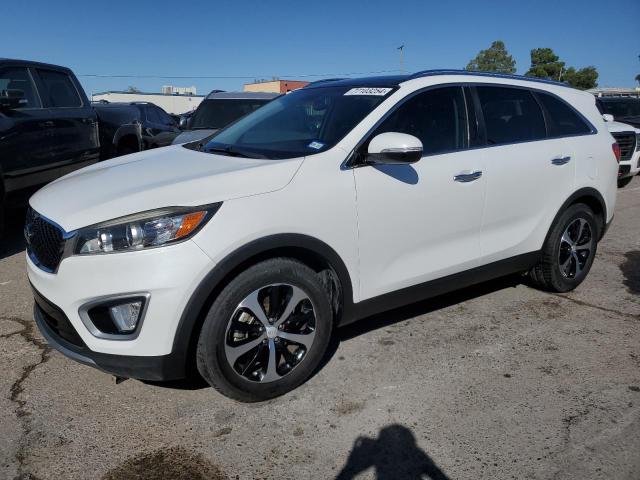 KIA SORENTO EX 2016 with VIN 5XYPH4A5XGG092666 - Photo from auction