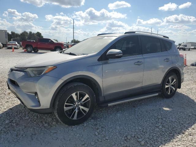 TOYOTA RAV4 XLE 2016 with VIN 2T3WFREV0GW289033 - Photo from auction