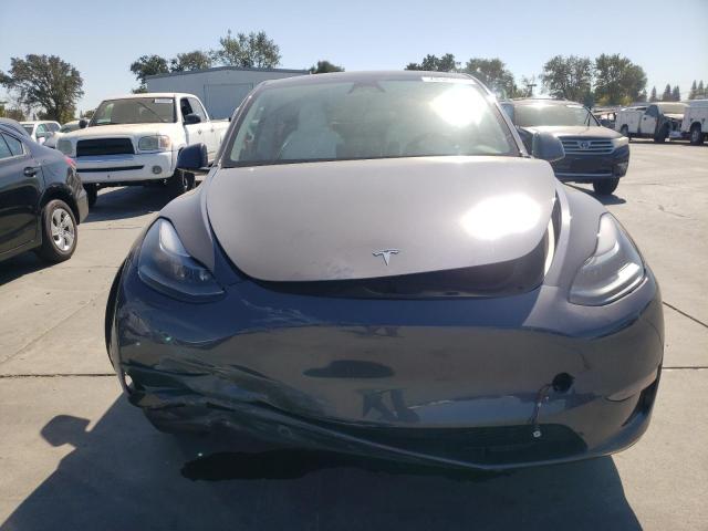 Photo 5 from auction – 2023 TESLA MODEL Y with VIN 7SAYGDEE9PF970633