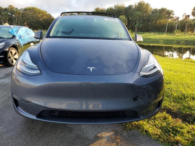 Photo 5 from auction – 2023 TESLA MODEL Y with VIN 7SAYGAEE0PF591891