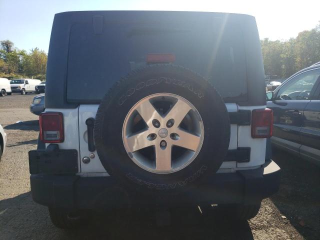 Photo 6 from auction – 2013 JEEP WRANGLER U with VIN 1C4BJWDG3DL582731