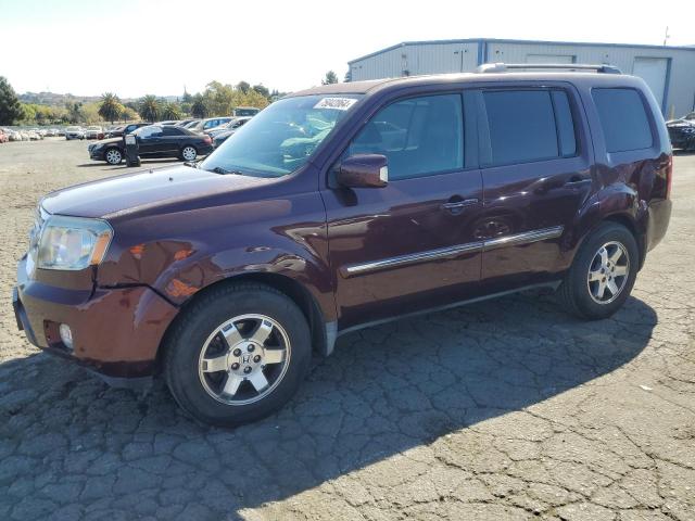 HONDA PILOT TOUR 2009 with VIN 5FNYF48939B055620 - Photo from auction