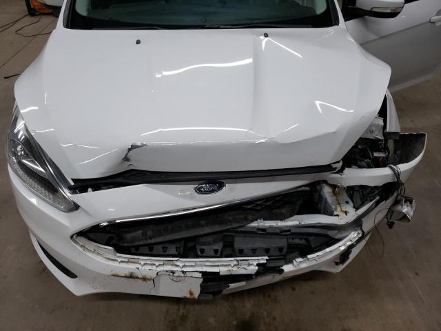 Photo 11 from auction – 2016 FORD FOCUS SE with VIN 1FADP3F2XGL370099