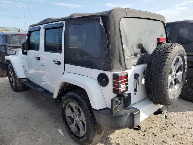 Photo 2 from auction – 2016 JEEP WRANGLER U with VIN 1C4BJWEG0GL105483