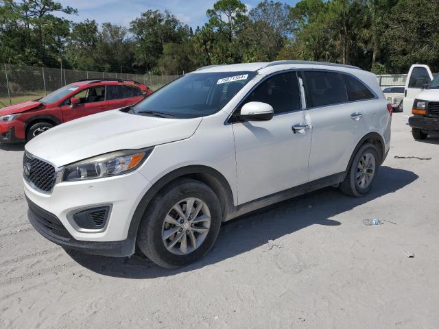 KIA SORENTO LX 2016 with VIN 5XYPG4A59GG110285 - Photo from auction