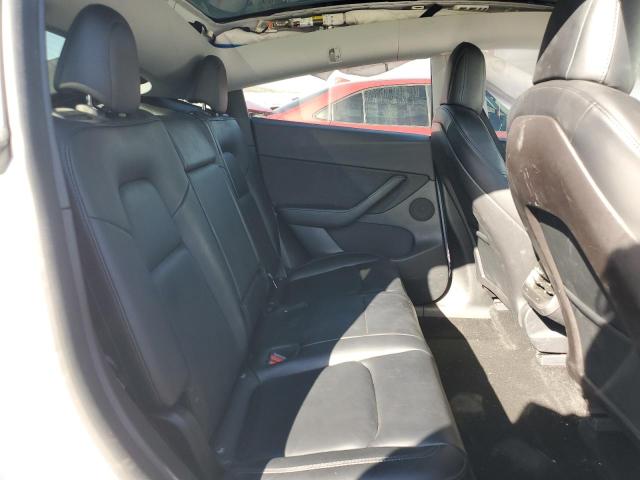 Photo 10 from auction – 2021 TESLA MODEL Y with VIN 5YJYGDEE9MF213725