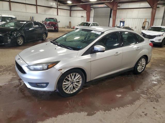 FORD FOCUS SE 2015 with VIN 1FADP3F27FL257029 - Photo from auction