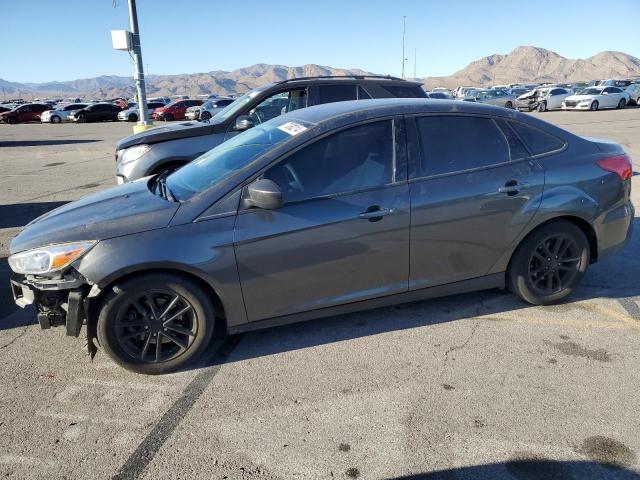 FORD FOCUS SE 2018 with VIN 1FADP3FE7JL270575 - Photo from auction