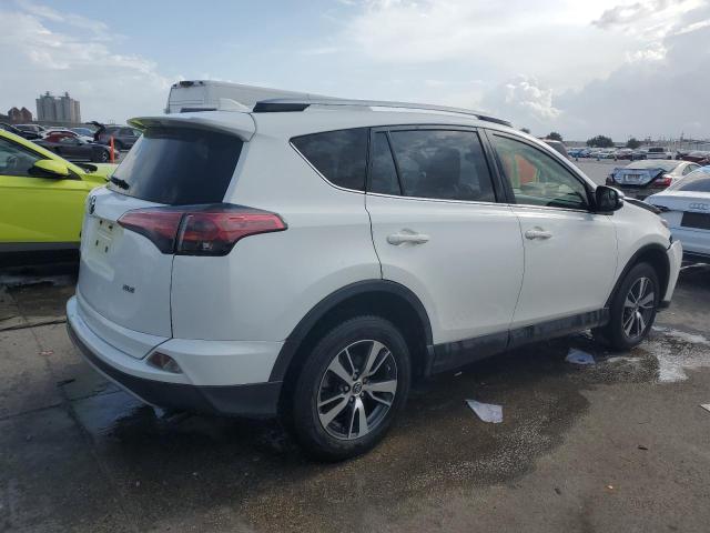 Photo 3 from auction – 2017 TOYOTA RAV4 XLE with VIN JTMWFREV1HJ713464