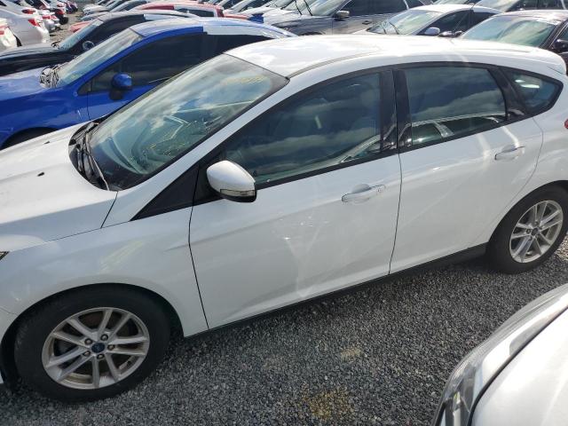 FORD FOCUS SE 2017 with VIN 1FADP3K29HL327509 - Photo from auction