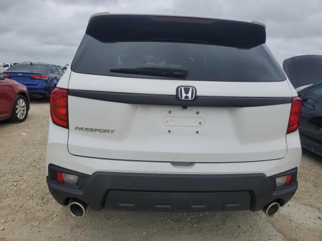 Photo 6 from auction – 2022 HONDA PASSPORT E with VIN 5FNYF7H57NB005196