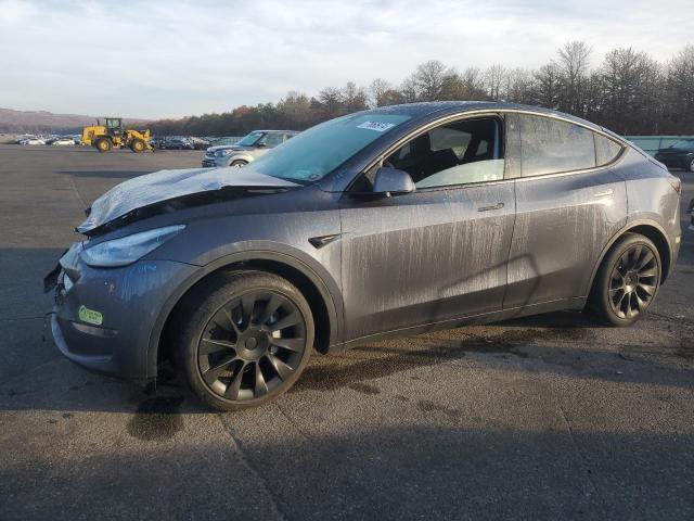 TESLA MODEL Y 2021 with VIN 5YJYGAEE8MF302037 - Photo from auction