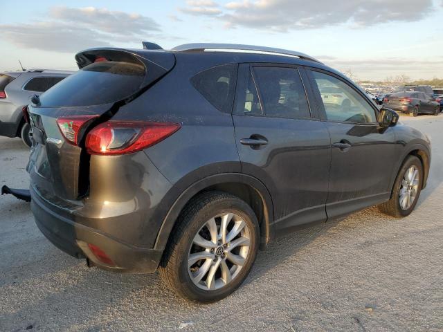 Photo 3 from auction – 2014 MAZDA CX-5 GT with VIN JM3KE2DY0E0303039