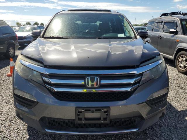 Photo 5 from auction – 2016 HONDA PILOT ELIT with VIN 5FNYF6H02GB074198