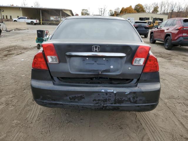 Photo 6 from auction – 2003 HONDA CIVIC LX with VIN 2HGES16533H511454