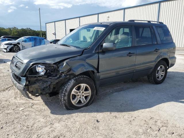 HONDA PILOT EXL 2003 with VIN 2HKYF18583H620769 - Photo from auction