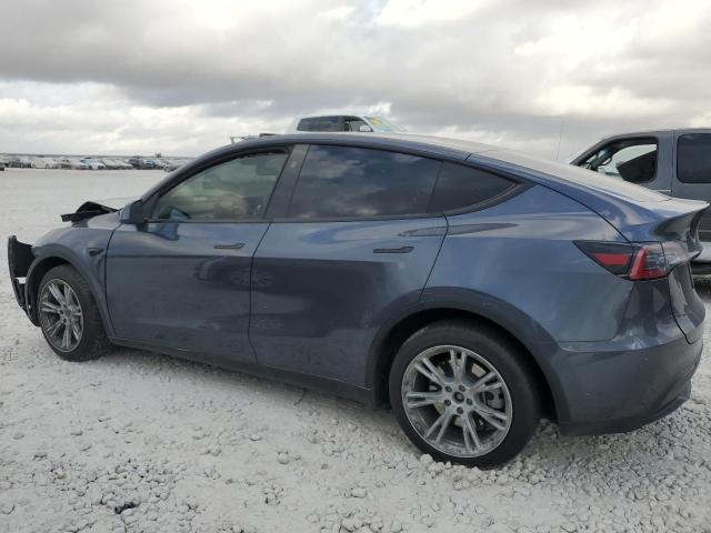 Photo 2 from auction – 2023 TESLA MODEL Y with VIN 7SAYGDEE3PA165028