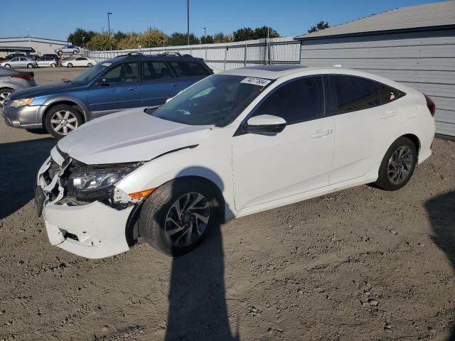 HONDA CIVIC EX 2018 with VIN 19XFC2F77JE208547 - Photo from auction