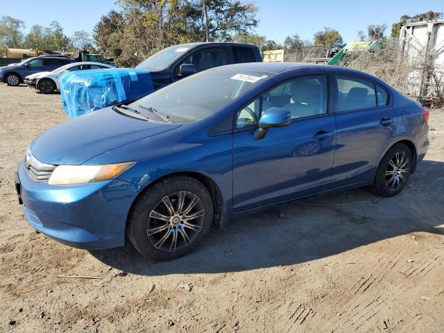 HONDA CIVIC LX 2012 with VIN 19XFB2F54CE051421 - Photo from auction