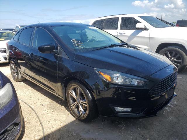Photo 4 from auction – 2018 FORD FOCUS SE with VIN 1FADP3FE7JL229282