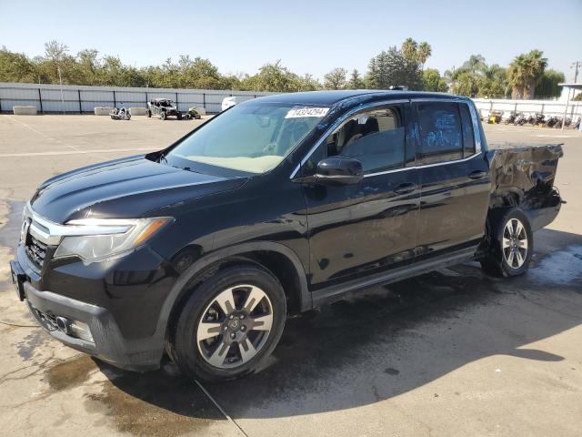 HONDA RIDGELINE 2017 with VIN 5FPYK2F60HB010813 - Photo from auction