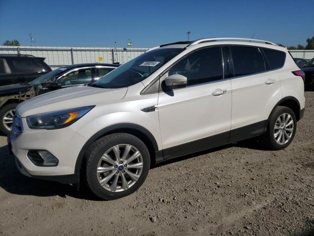 FORD ESCAPE TIT 2017 with VIN 1FMCU9J91HUD32127 - Photo from auction