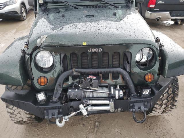Photo 11 from auction – 2011 JEEP WRANGLER U with VIN 1J4HA5H1XBL618545