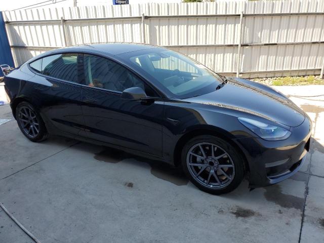 Photo 4 from auction – 2022 TESLA MODEL 3 with VIN 5YJ3E1EA7NF185761
