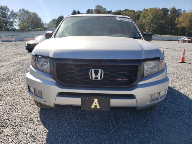 Photo 5 from auction – 2014 HONDA RIDGELINE with VIN 5FPYK1F71EB011953