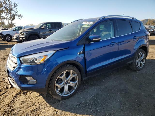 FORD ESCAPE TIT 2017 with VIN 1FMCU0J95HUB41161 - Photo from auction