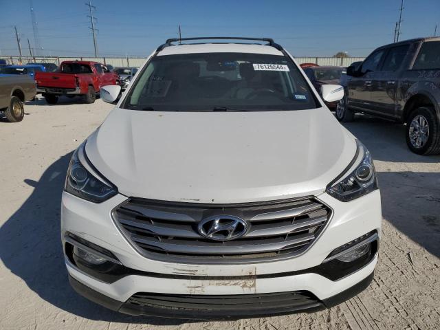 Photo 5 from auction – 2017 HYUNDAI SANTA FE S with VIN 5NMZU3LB0HH008153