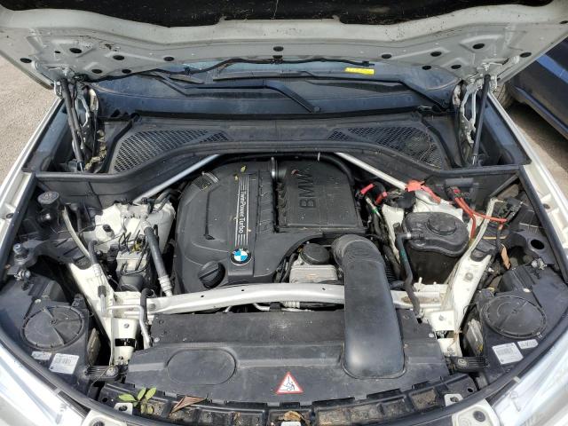 Photo 12 from auction – 2014 BMW X5 SDRIVE3 with VIN 5UXKR2C5XE0C01012